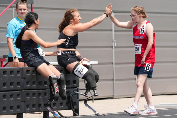 Adaptive athletes congratulate one another at Dairyland Games